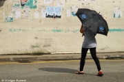 Never without a parasol in the sunlight