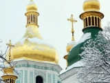 A detail shot from the golden coated domes of The Saint Sophia Cathedral