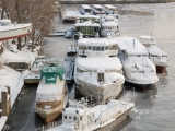 Boats afloat on Dnieper river stay put throughout the winter due to the frost.