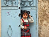 A curious little girl in Aleppo
