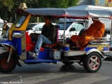 Buddhist priests use Tuk Tuks as well